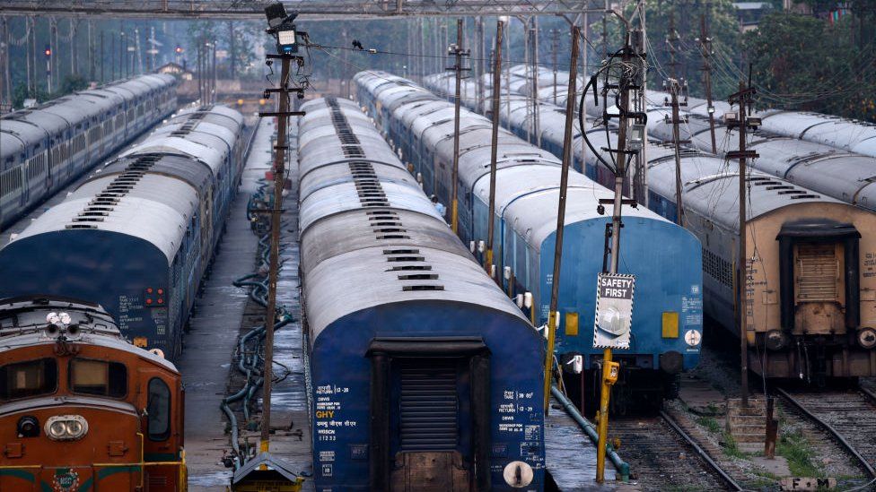 Trains are seen parked at Guwahati Railway Station, during nationwide lockdown