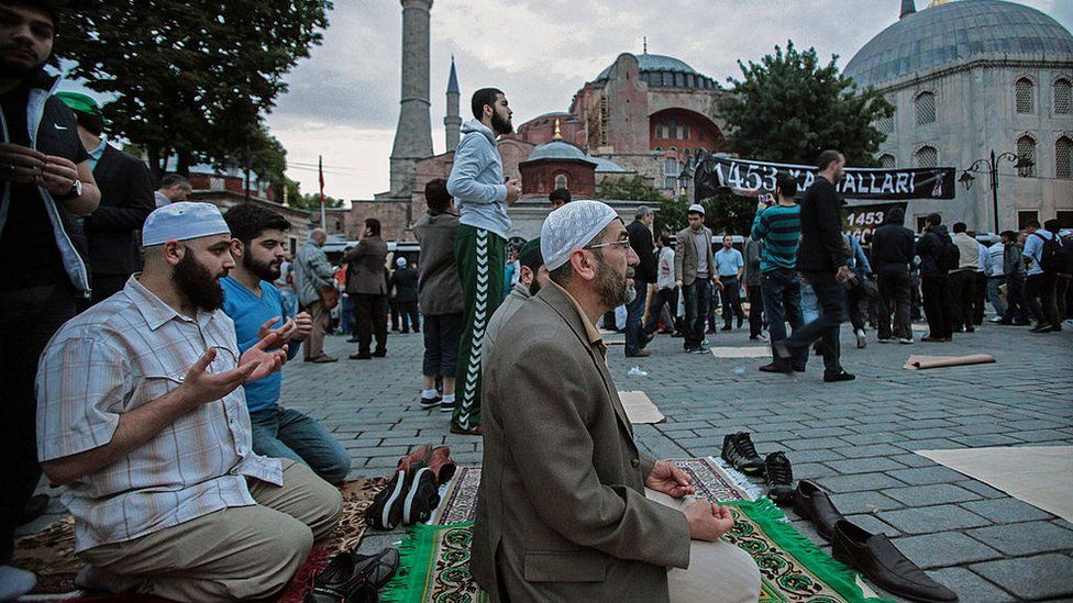 Muslims gather and pray outside the Hagia Sophia in May 2014