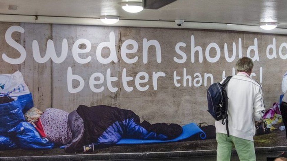 A poster showing homeless people with the text "Sweden should do better than this"