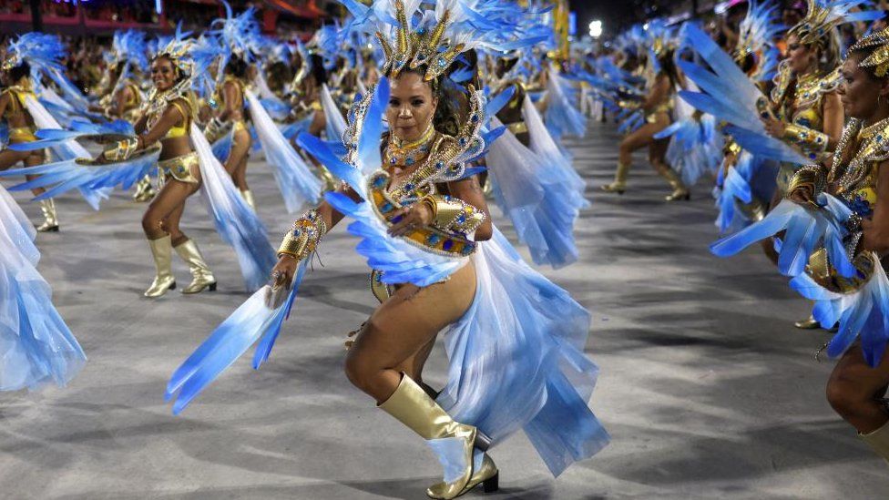 Revellers from Portela samba school perform during the second night of the carnival parade at the Sambadrome, in Rio de Janeiro, Brazil February 20, 2023.