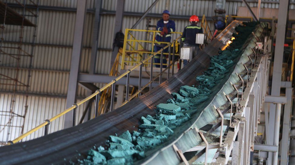 A conveyor belt carries chunks of raw cobalt after initial processing at a plant in Lubumbashi, Democratic Republic of Congo, before being exported to be refined.