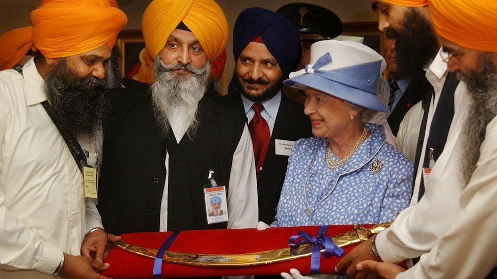 The Queen receives a sword from Sikh leaders