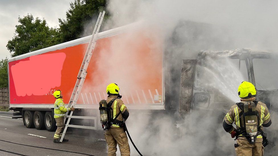 Firefighters with the lorry