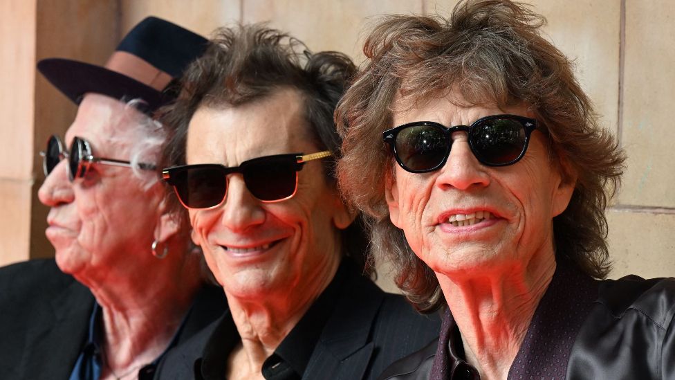 Keith Richards, Ron Wood and Mick Jagger of legendary British rock band, The Rolling Stones pose as they arrive to attend a launch event for their new album, "Hackney Diamonds" at Hackney Empire in London on September 6, 2023, their first album of original material since 2005
