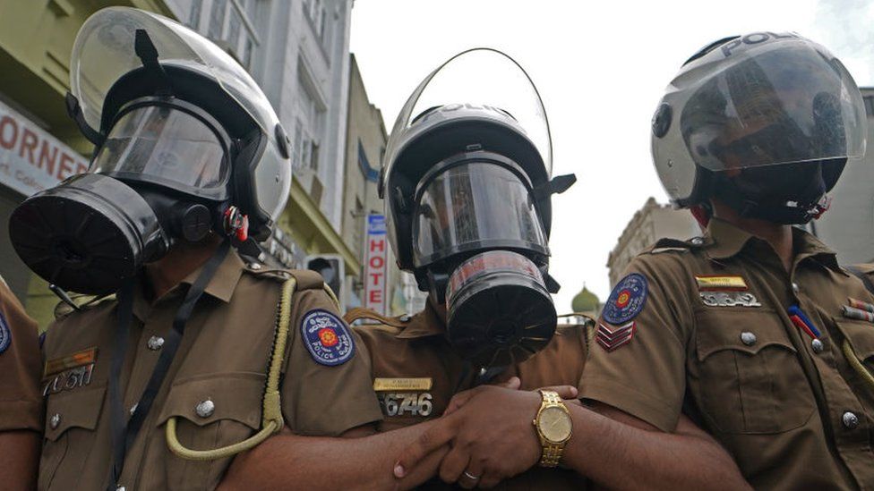 Sri Lankan police during a protest in Colombo on 6 July 2022.