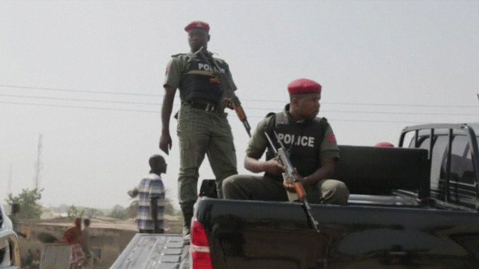 Nigerian police at the scene of the mosque attack in north-east Nigeria, 1 May 2018