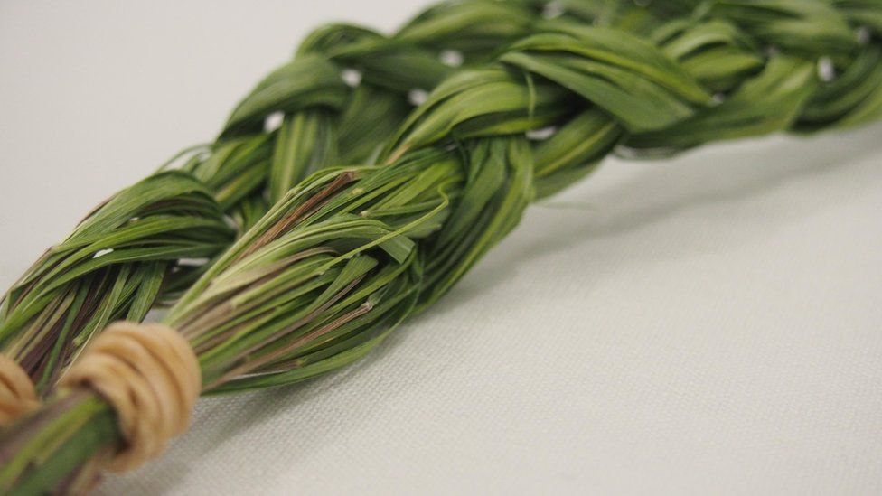 pieces of braided sweetgrass