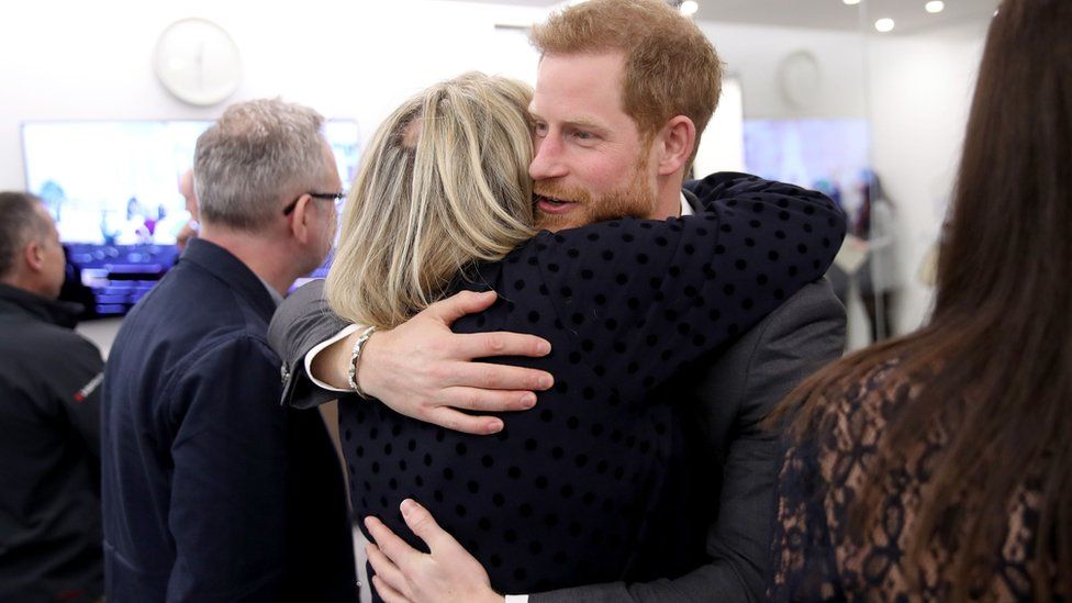 Prince Harry hugs journalist Bryony Gordon during the first Royal Foundation Forum in central London in 2018