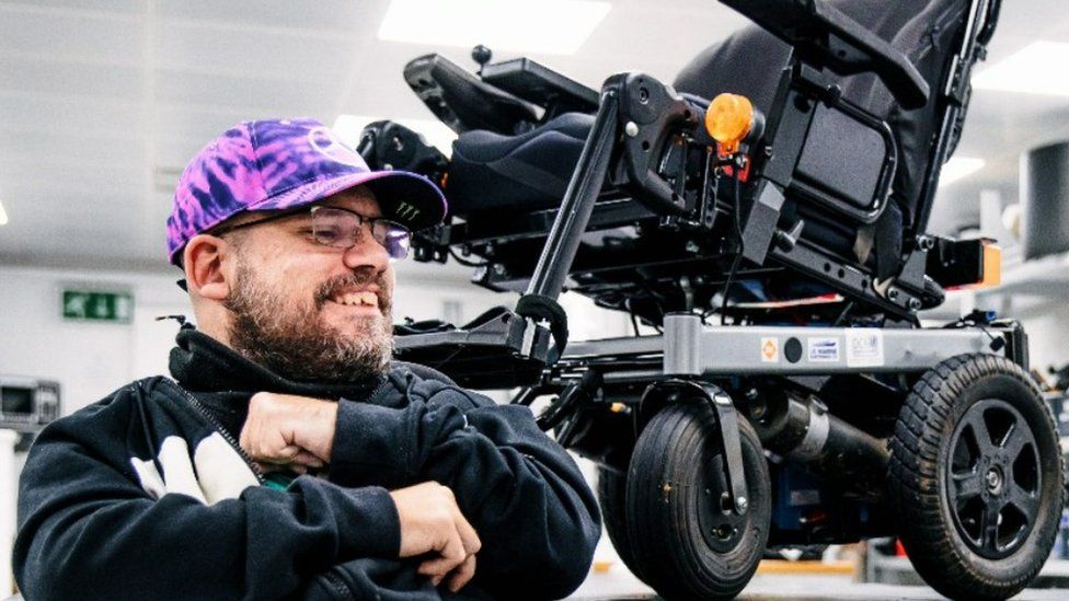 Adam Wharmby with his wheelchair