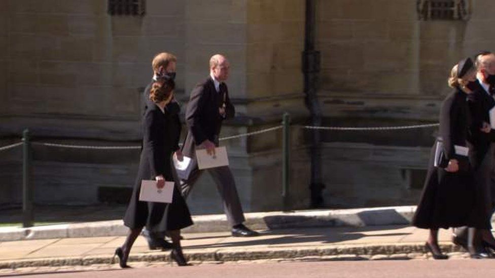 The Duke and Duchess of Cambridge and the Duke of Sussex chatting after the service