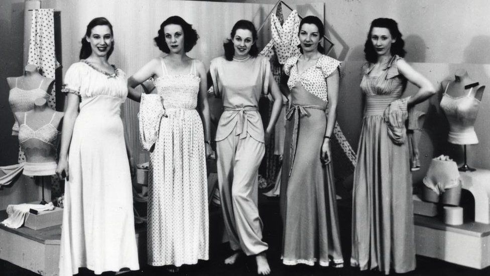 Women posing for a lingerie fashion show in 1947