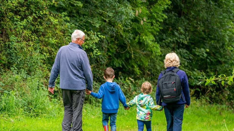 A family in some woods