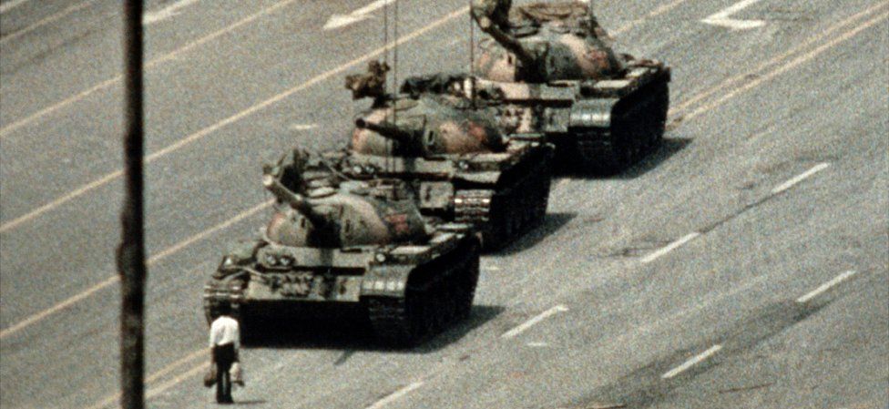 Protester stands in way of Chinese tanks in Beijing, 5 June 89