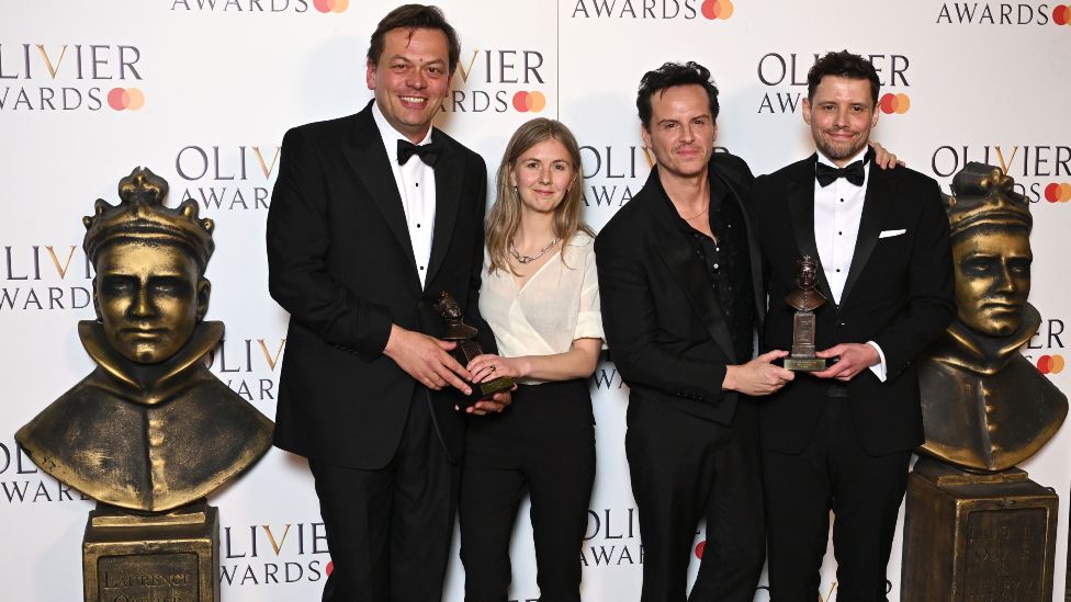Simon Stephens, Rosanna Vize, Andrew Scott and Sam Yates, accepting the Best Revival award for "VANYA", pose in the winners room at The Olivier Awards 2024 at The Royal Albert Hall on April 14, 2024 in London, England.