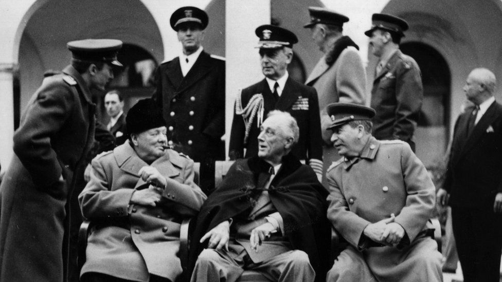 British Prime minister Winston Churchill (L), US president Franklin Delano Roosevelt (C) and USSR Secretary general of the Soviet Communist Party (PCUS), Joseph Stalin (R) pose at the start of the Conference of the Allied powers in Yalta, Crimea, on February 4, 1945 at the end of World War II.