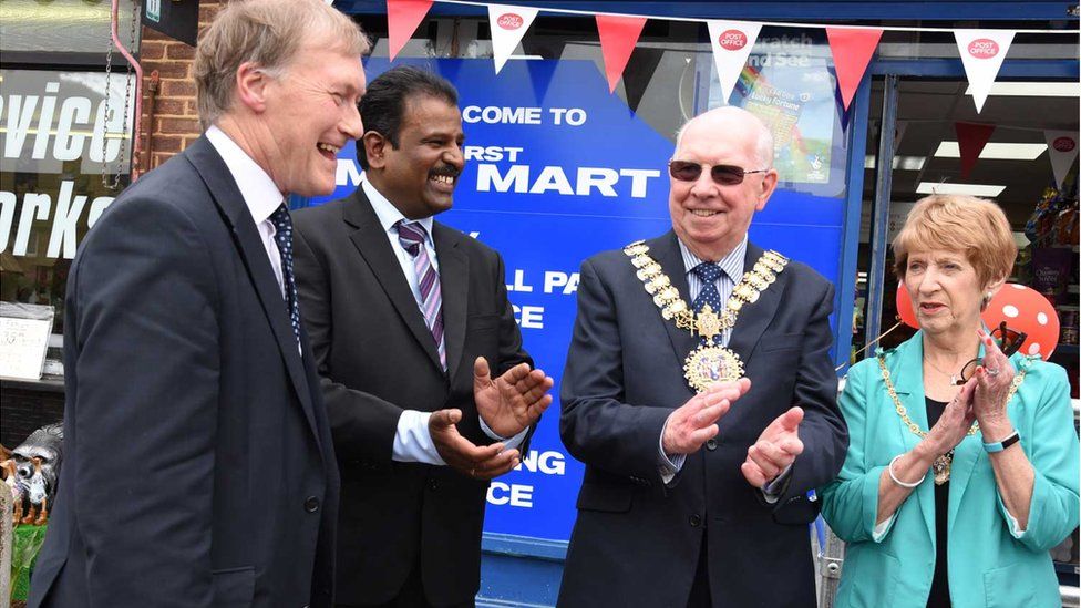 Sir David celebrates the opening of a new post office in Southend