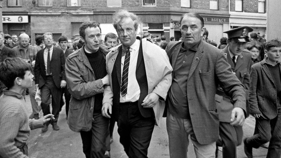 Eamonn McCann (l) with Ivan Cooper who had been injured during rioting