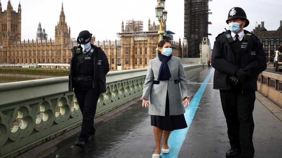 Home Secretary Priti Patel with Met Police officers