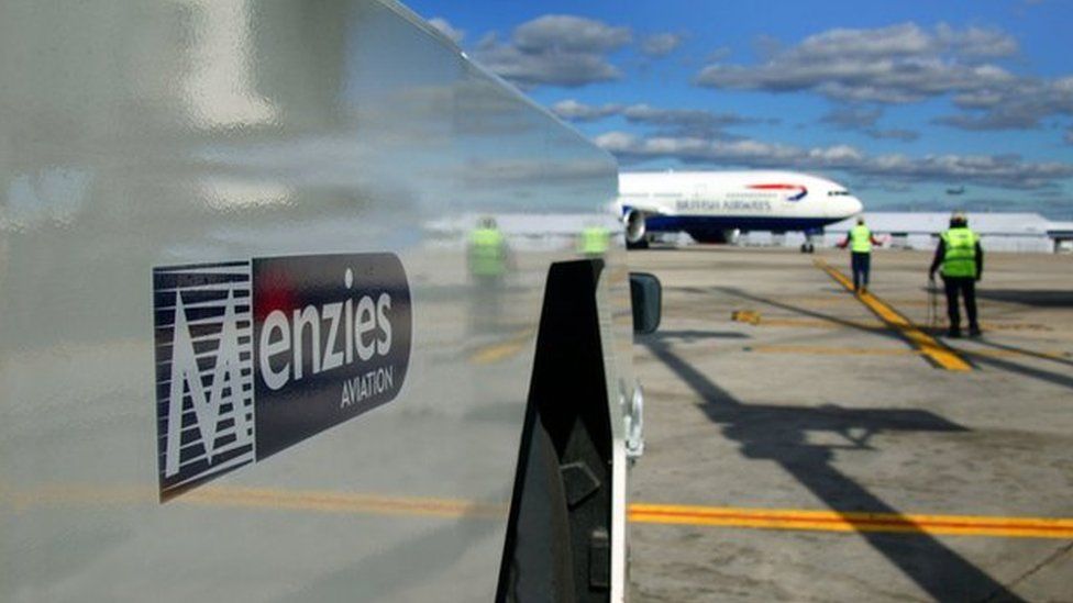 Menzies Aviation logo at airport terminal