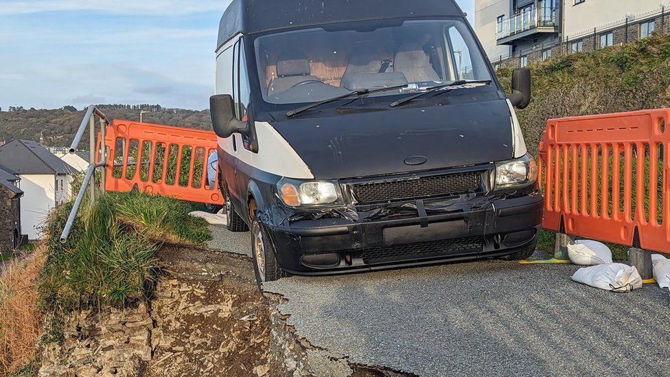 Van on edge of landslip