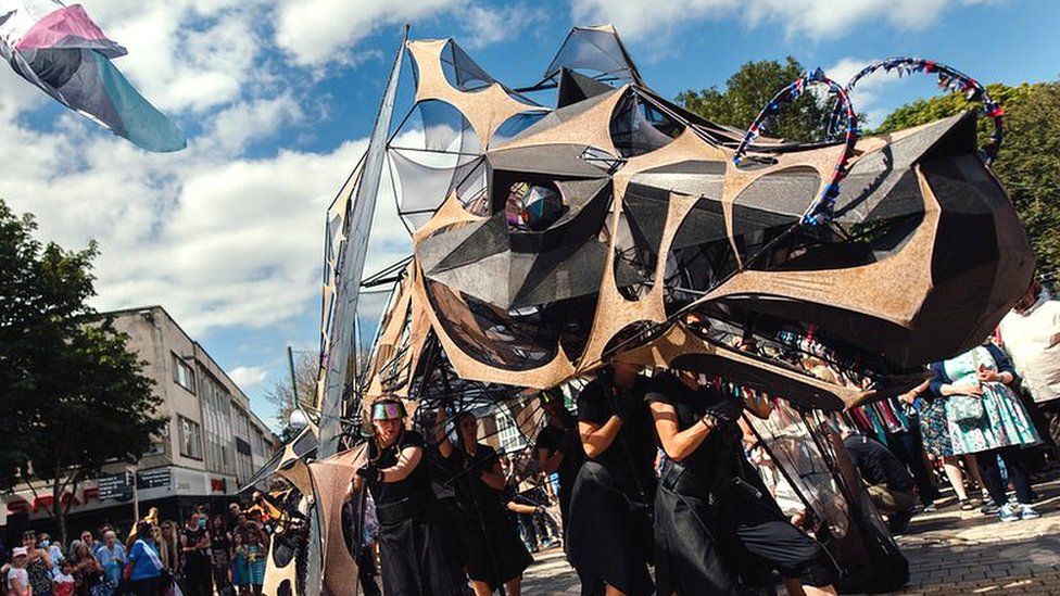Hatchling Giant dragon puppet flies off Plymouth coast BBC News
