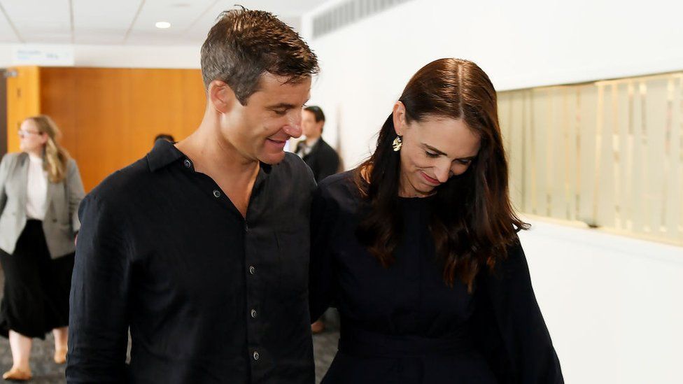 New Zealand Prime Minister Jacinda Ardern and partner Clarke Gayford leave after she announces her resignation at the War Memorial Centre on January 19, 2023