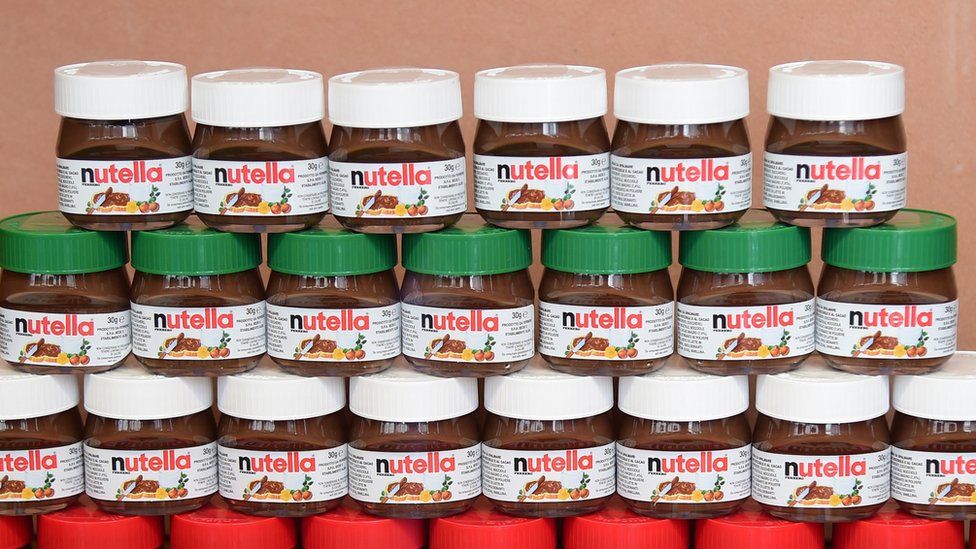 Small pots of Nutella are on display in a jewelery on May 17, 2014 in Alba, northern Italy, during the celebrations of the spread's 50th anniversary