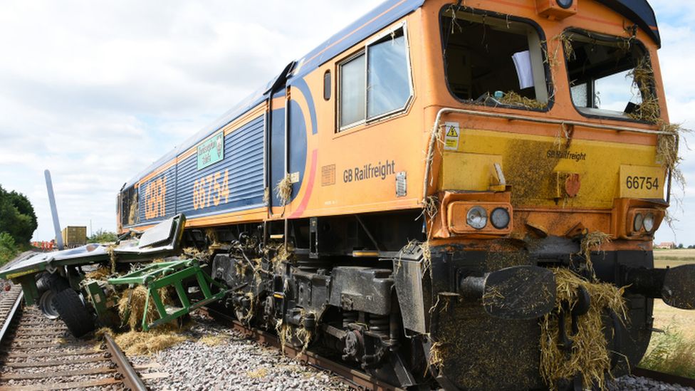 Train and bale chaser after crash