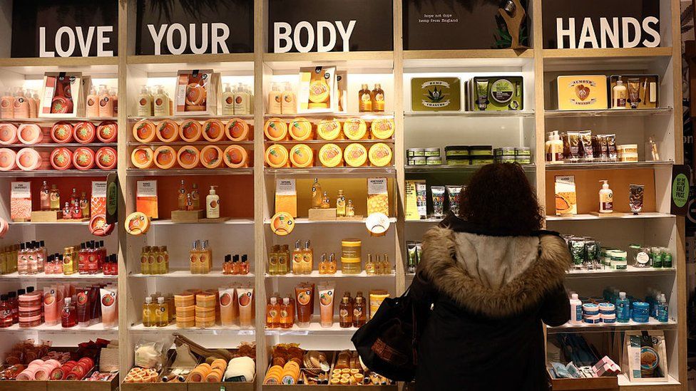 Woman browsing in the Body Shop