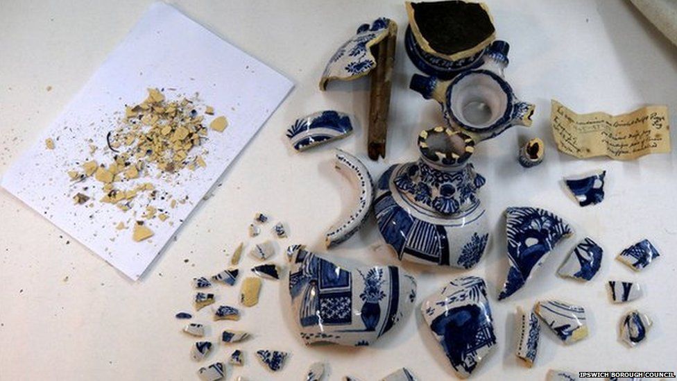 Broken vase and pieces