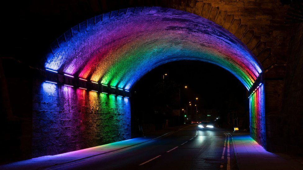 Archway Road railway bridge lit up in rainbow colours