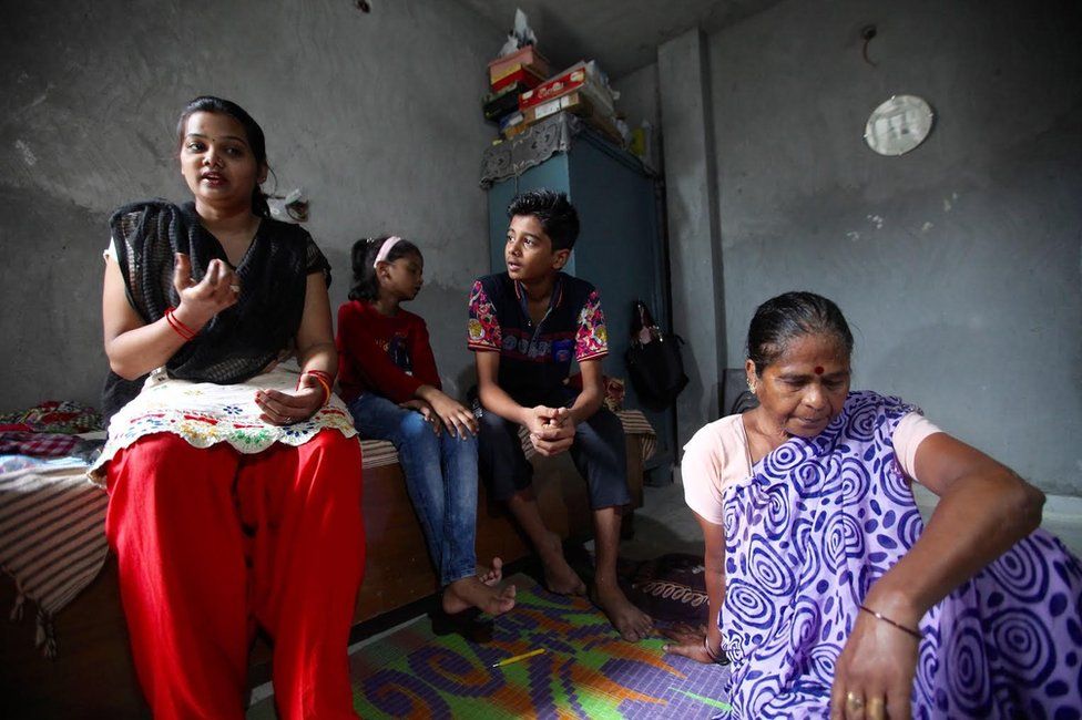 Tirath Singh's family. From left to right, his wife Shashi, 37, daughter, Poornima, 10, son, Guarav, 15, and seated on the floor, his 62-year-old mother