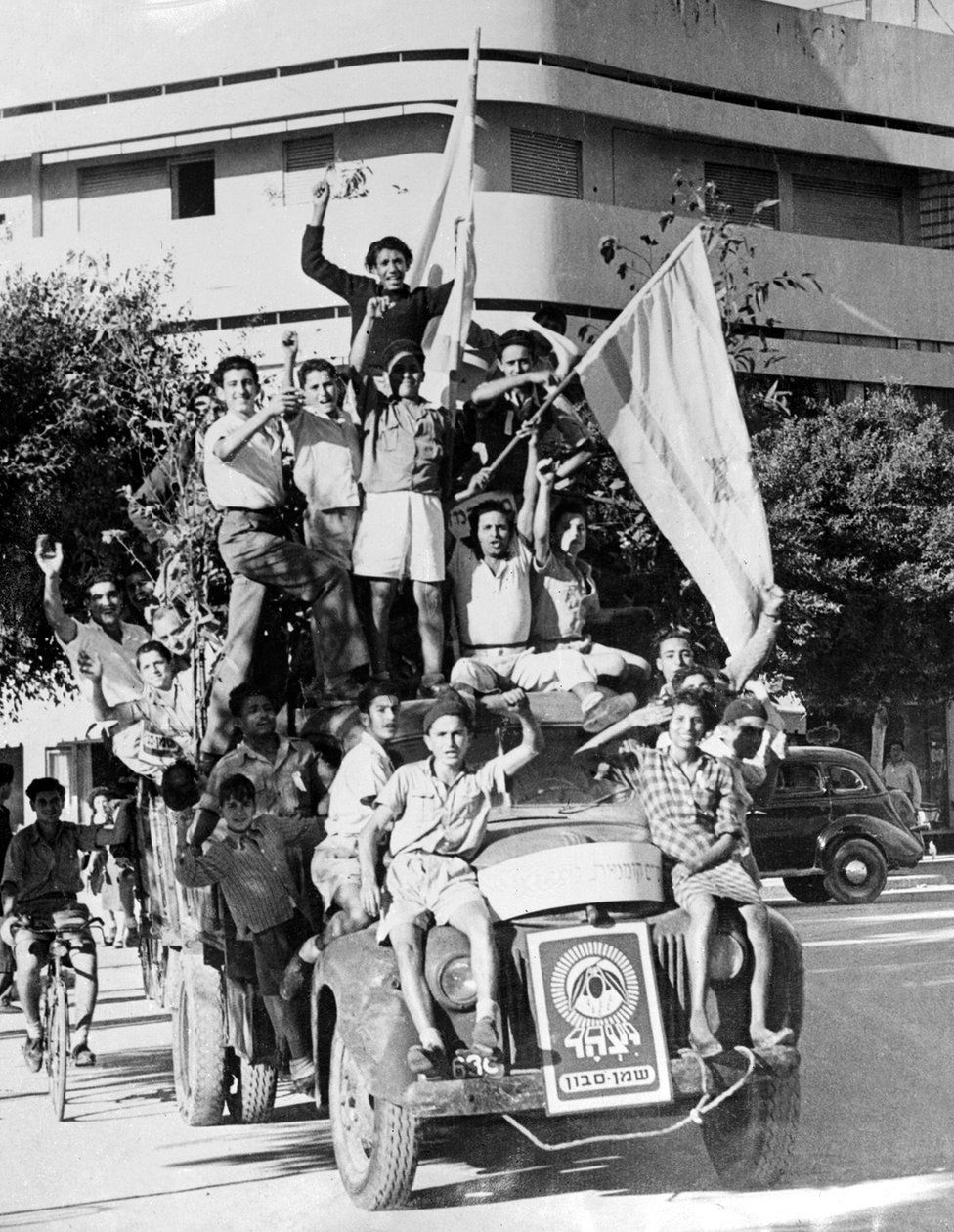 Young Jews celebrate the proclamation of a new State of Israel on 14 May 1948 in Tel Aviv