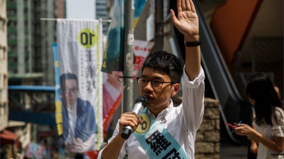 Nathan Law, 23, a leader of the 2014 pro-democracy rallies, campaigns for his political party Demosisto party during the Legislative Council election in Hong Kong on September 4, 2016.
