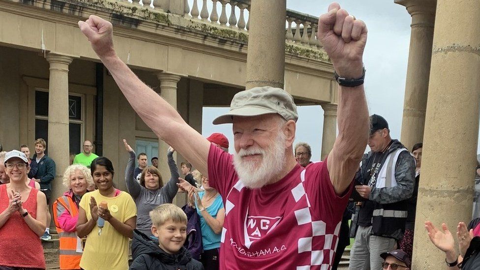 Rodney Freeburn cheering at the start of Norwich Parkrun