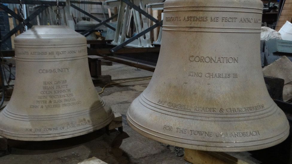 Two new bronze church bells inscribed Community and Coronation