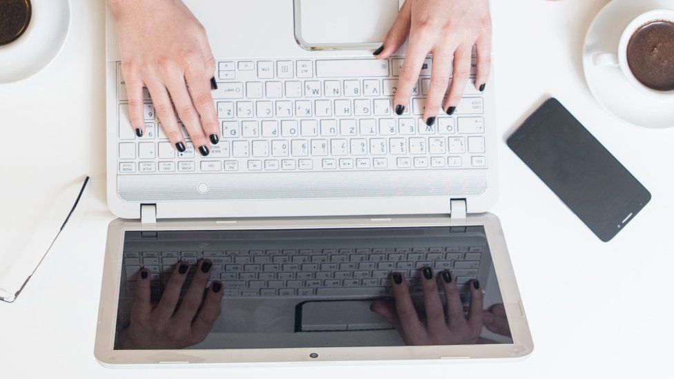 Hands on laptop