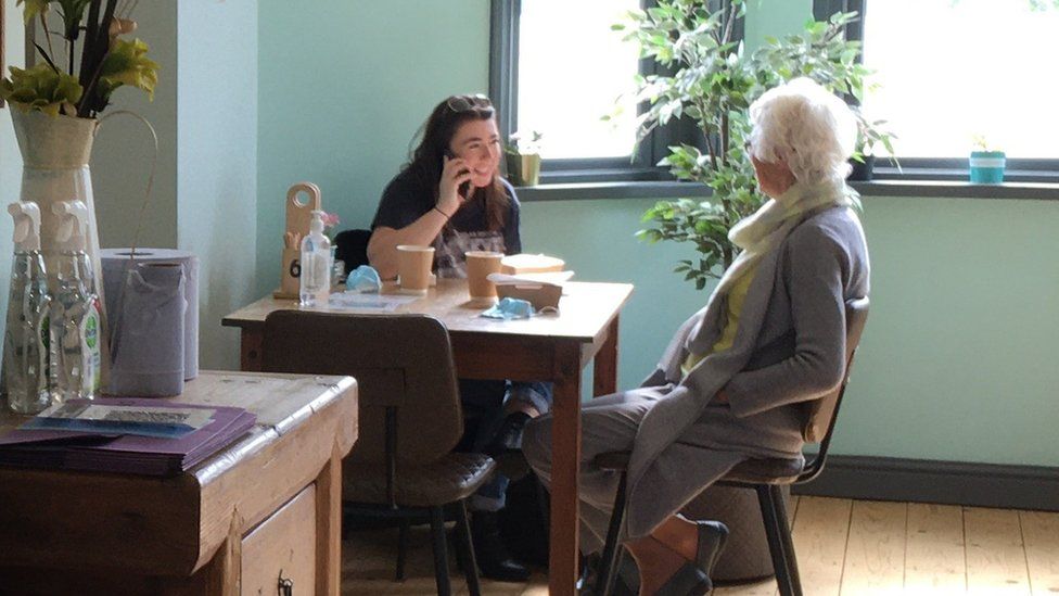 women inside cafe