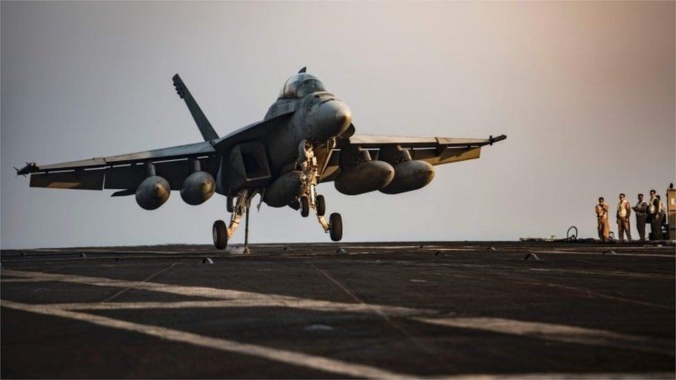 F/A-18F Super Hornet preparing to make an arrested landing on the flight deck of the aircraft carrier USS Dwight D. Eisenhower (CVN 69) (Ike) in the Arabian Gulf after a mission in support of Operation Inherent Resolve. (31 July 2016)