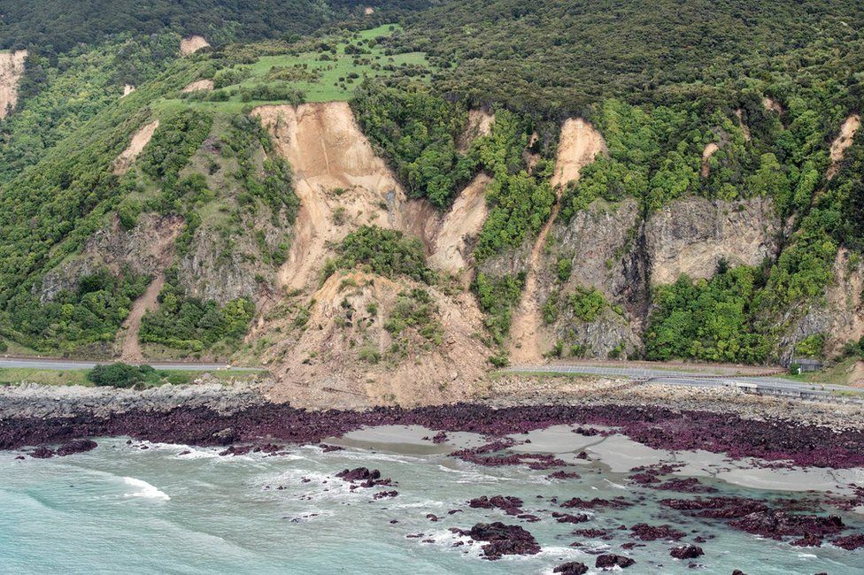 A handout picture released by the New Zealand Defence Force (NZDF) on 14 November 2016 shows an aerial view taken during aerial surveys by Royal New Zealand Air Force (RNZAF) aircraft showing damage to infrastructure following the 7.5 magnitude Hanmer Earthquake near the Kaikoura Coast, New Zealand.