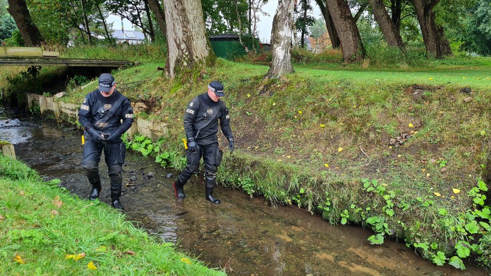 Officers search at the golf club