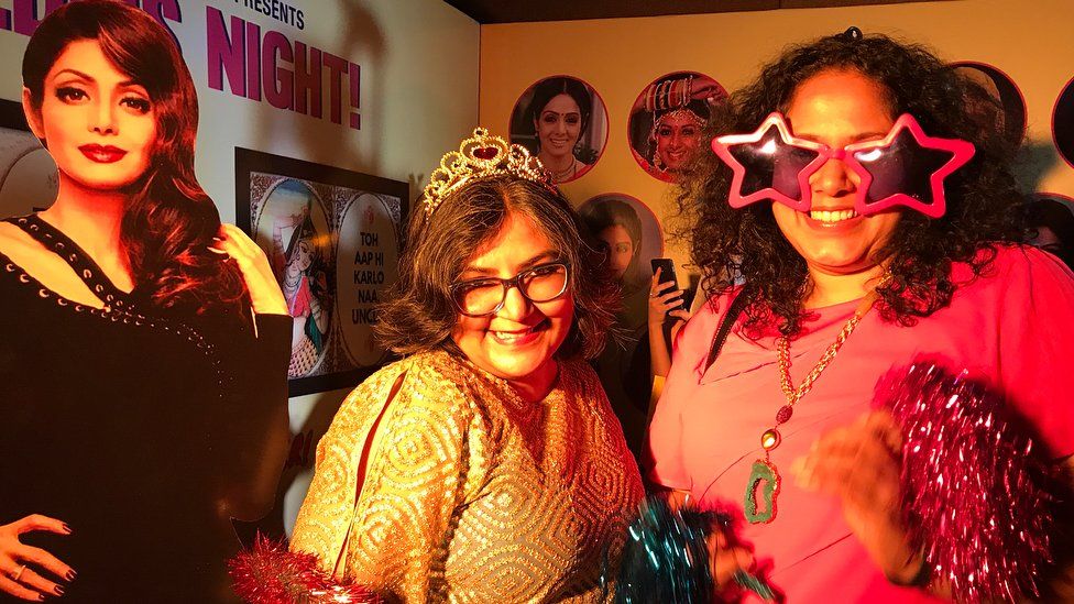 Posing and playing at the special Sridevi photo booth with lots of costume accessories
