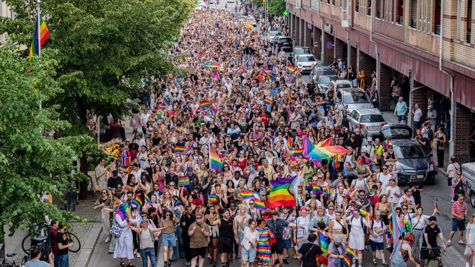 People march in Oslo following a shooting attack. Photo: 25 June 2022