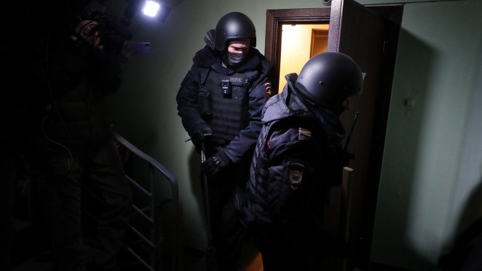 Policemen leave the flat of opposition leader Alexei Navalny in Moscow, Russia, 27 January 2021