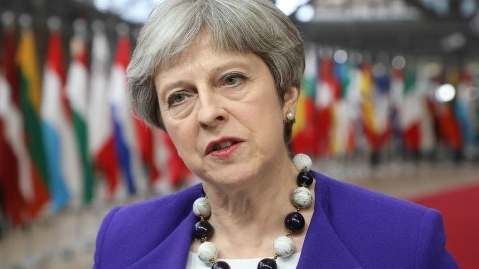 Theresa May being interviewed at EU headquarters in Brussels