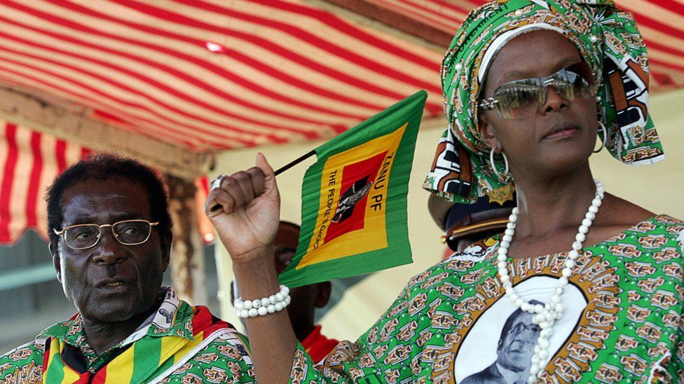 Zimbabwe President Robert Mugabe and leader of the rulling party ZANU PF (Zimbabwe African National Union - Patriotic Front party) and his wife Grace attend at Mugabe"s campaign rally in Harare on March 28, 2008.