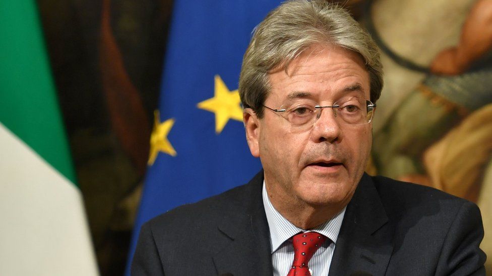 Italian Prime Minister Paolo Gentiloni speaks during a joint press conference with Colombian President at the Chigi Palace, in Rome on December 16, 2016.