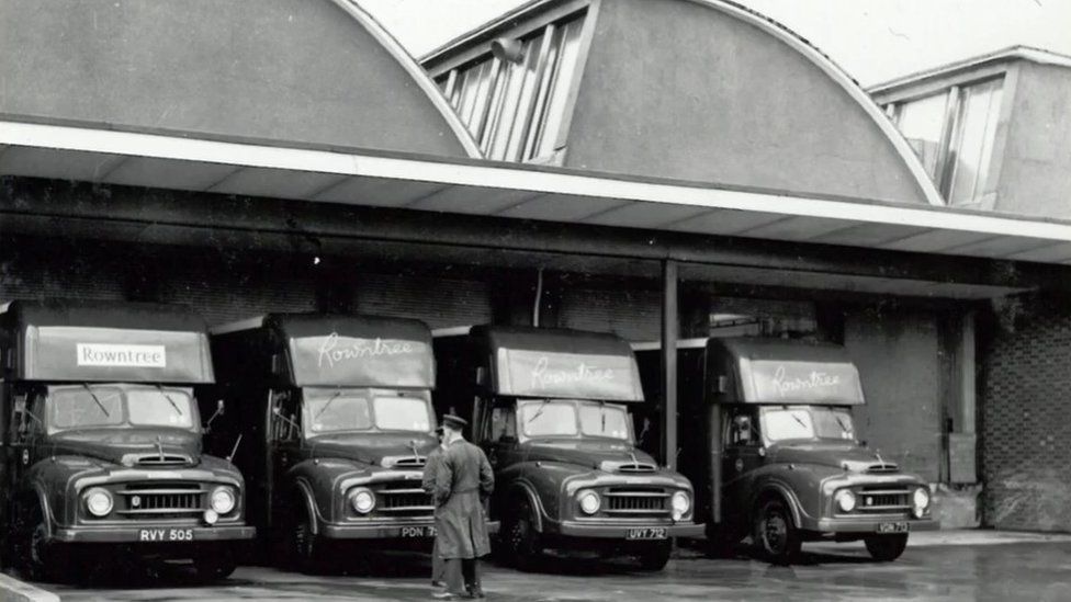 Rowntree vans in a black and white photo