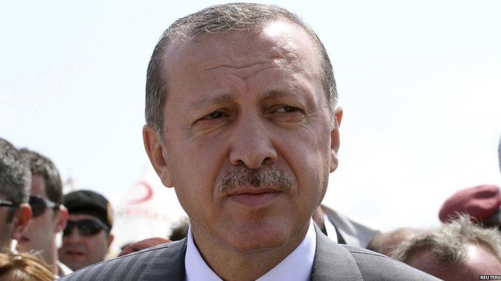 Turkey's Prime Minister Tayyip Erdogan visits the Seyidka camp in Somalia's capital Mogadishu 19 August 2011