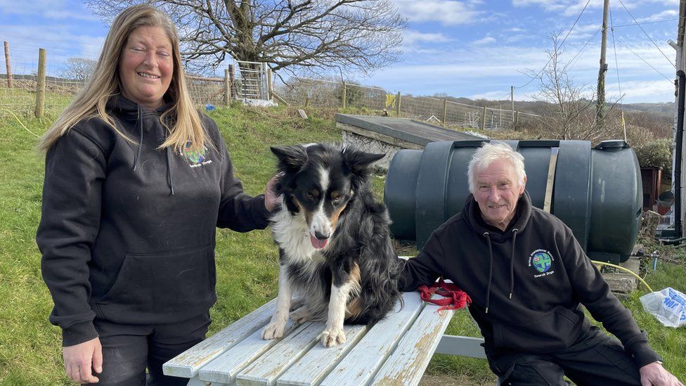 Emma Whittle, Brian Jones and search rescue dog Cai
